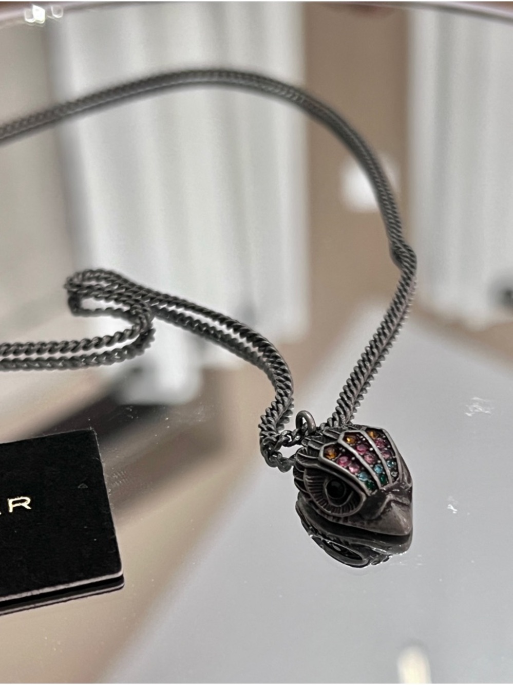 Kurt Geiger Silver Gunmetal Eagle Logo Necklace with Multicolor Stones